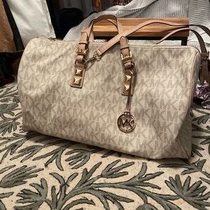 Large Michael Kors leather duffel bag